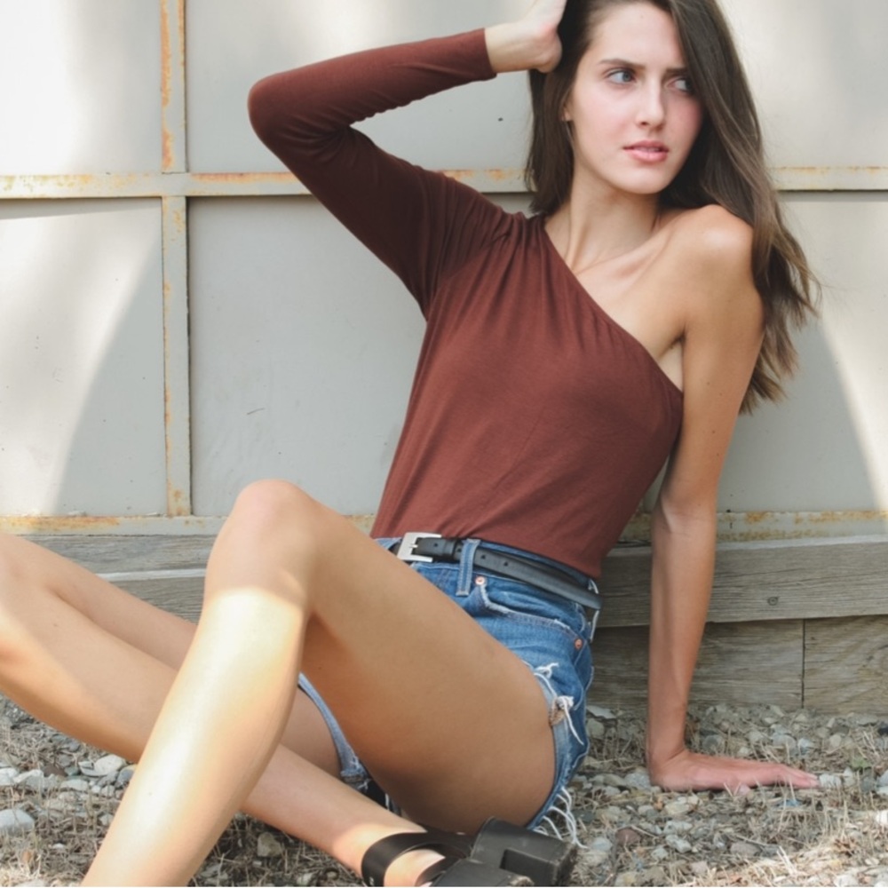 Just Fab one shoulder burnt orange top. Small bodysuit